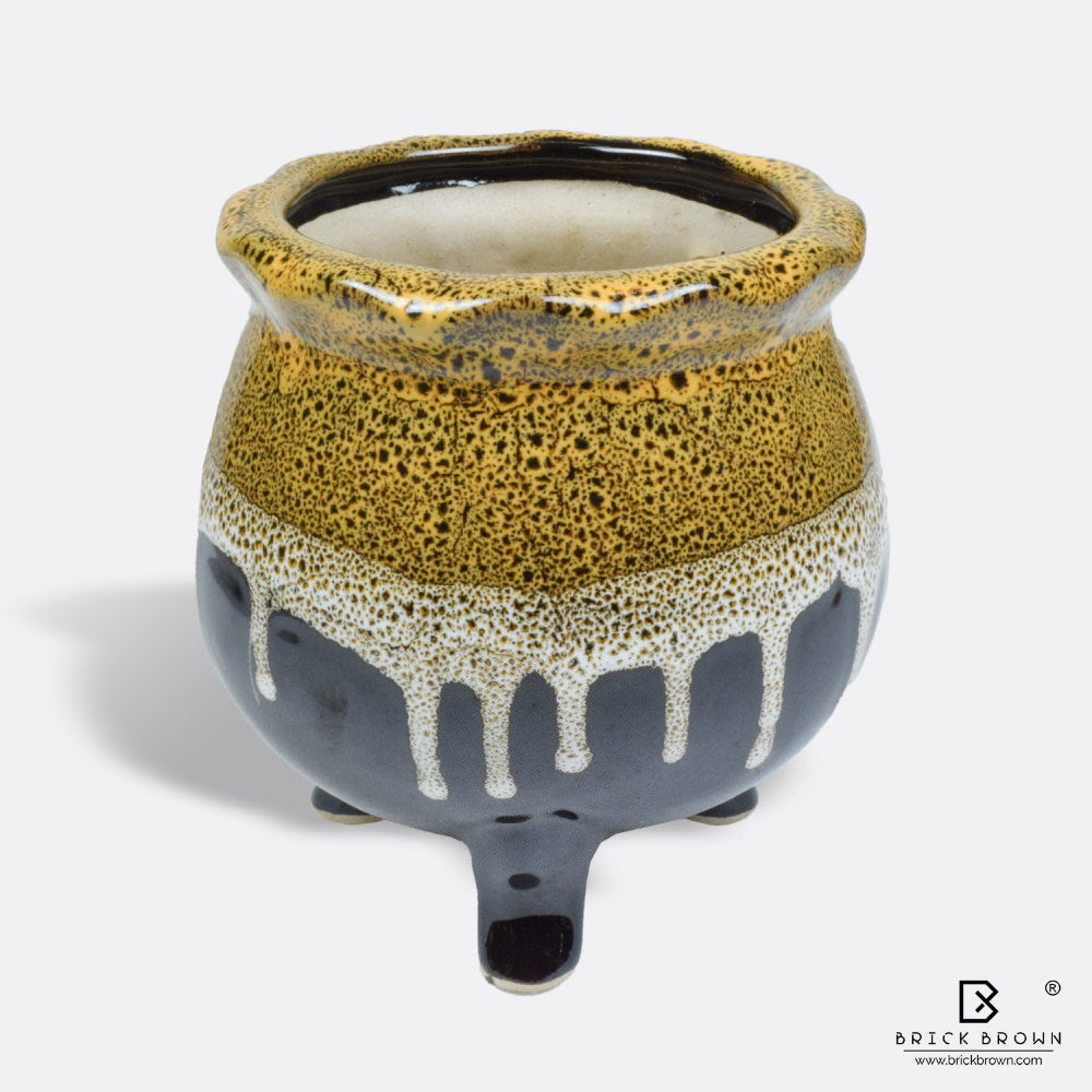 Three Legs Handi Planter in Orange from the Wildscape Collection